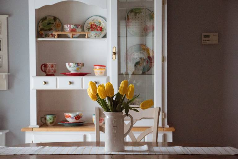 a table runner and flowers