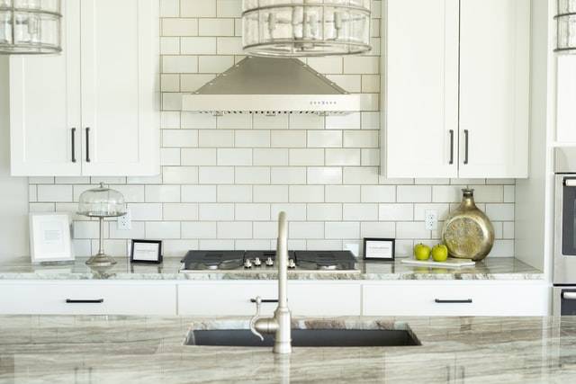 shiny surfaces to represent 5 ways to make your kitchen look bigger