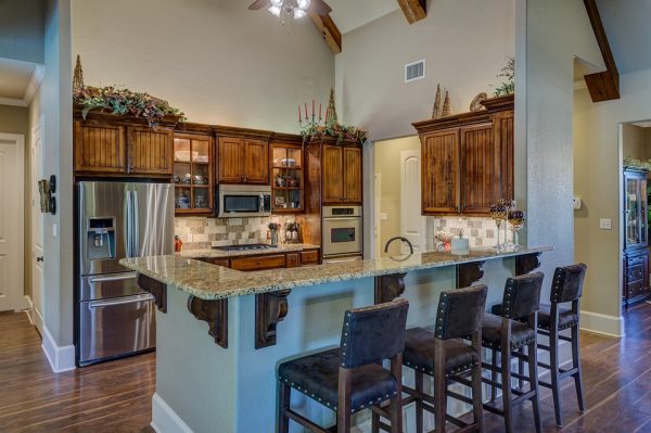 A modern yet traditional kitchen with breakfast bar