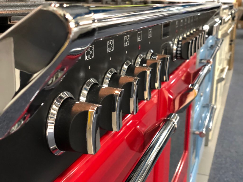 Angle shot of different coloured ovens