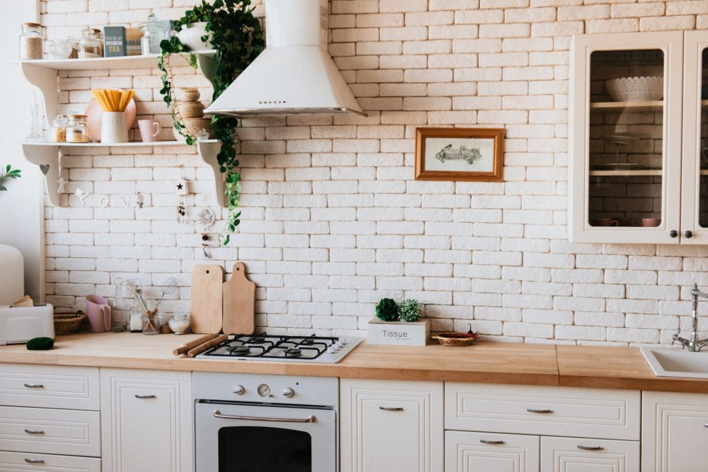 Stylish kitchen with white cabinets
