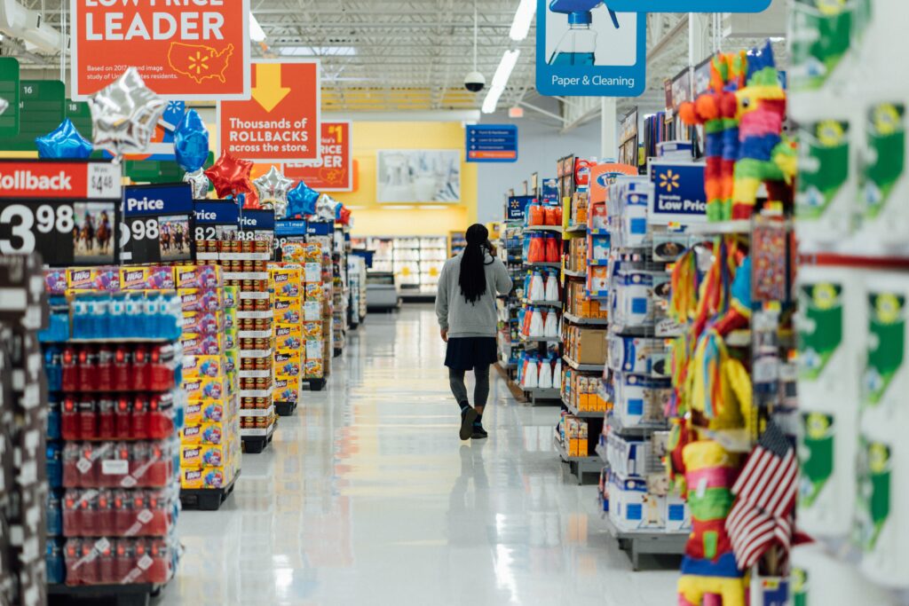 a man walking through a supermarket